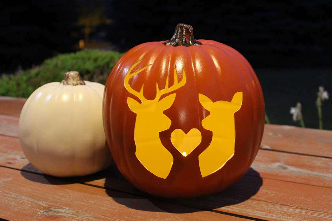 fully carved foam pumpkin at night